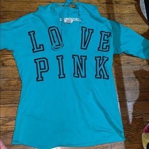 Blue sweater from pink